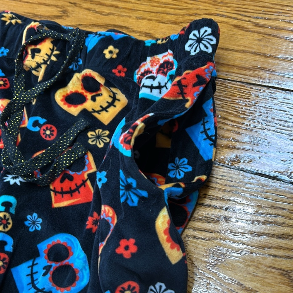 Disney Pixar Coco theme velour pajama pants. Black w/colorful skulls. Size Large - Picture 3 of 10